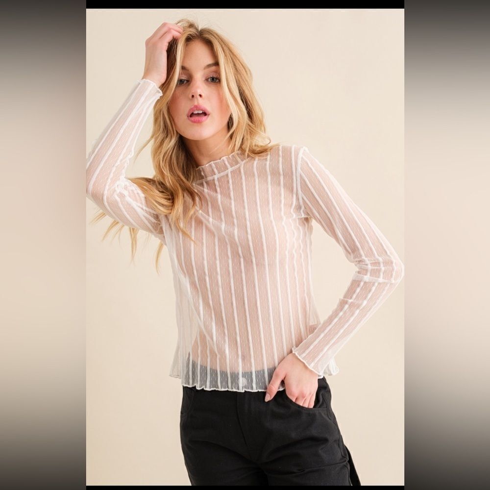semi-transparent long-sleeved white top with high neck